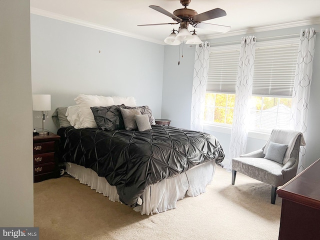 bedroom with ceiling fan, light colored carpet, and ornamental molding