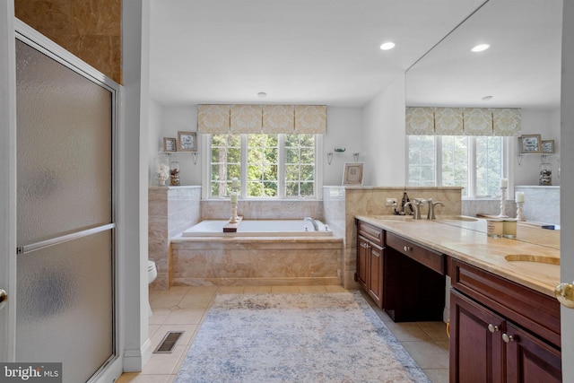 full bathroom with tile patterned flooring, vanity, a healthy amount of sunlight, and shower with separate bathtub