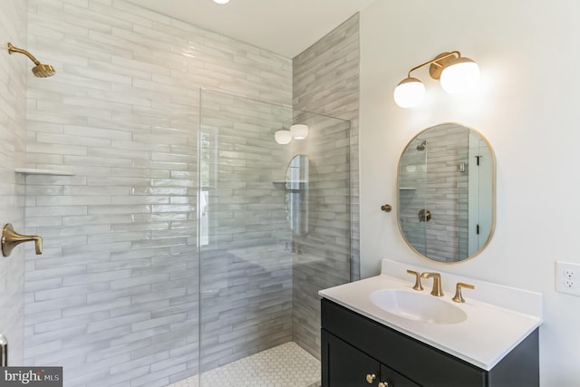 bathroom with vanity and an enclosed shower