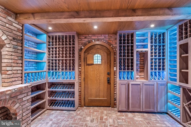 wine cellar with wooden ceiling