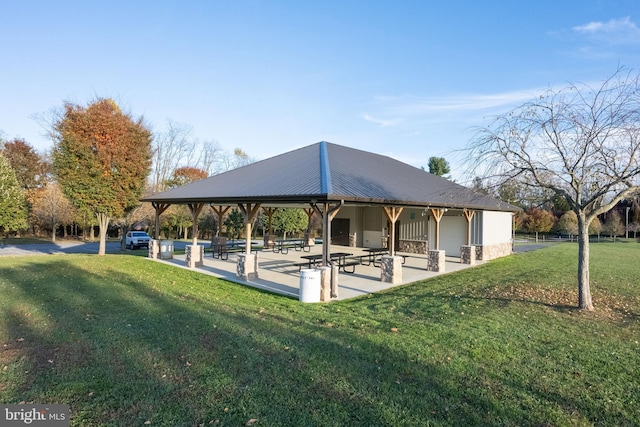 view of nearby features with a patio and a yard