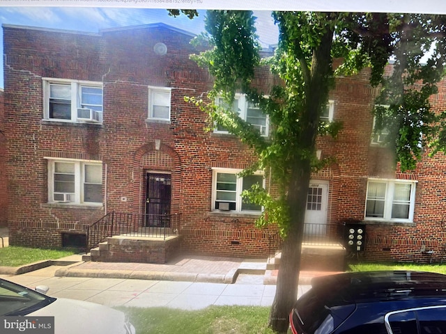 view of front of house featuring central AC