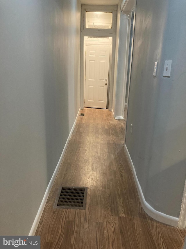 corridor featuring hardwood / wood-style flooring