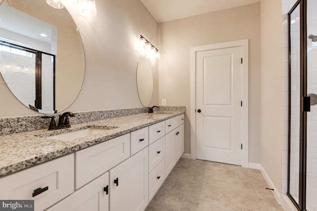 40 N Berlin Pike, Lovettsville, VA 20180 - bathroom with double vanity, a stall shower, baseboards, and tile patterned floors
