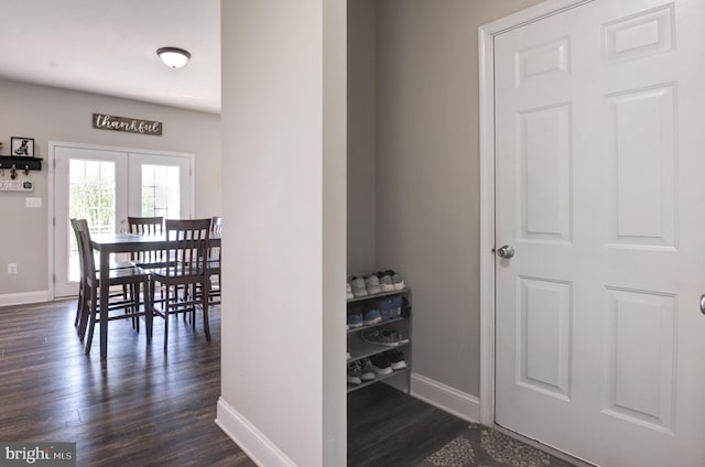 dining room with dark hardwood / wood-style floors