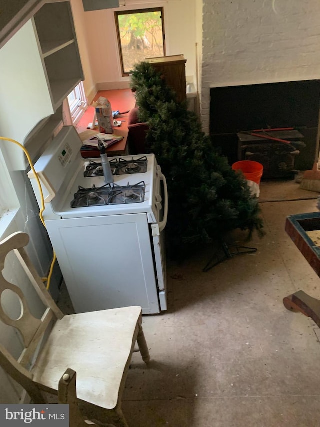 kitchen with white gas range