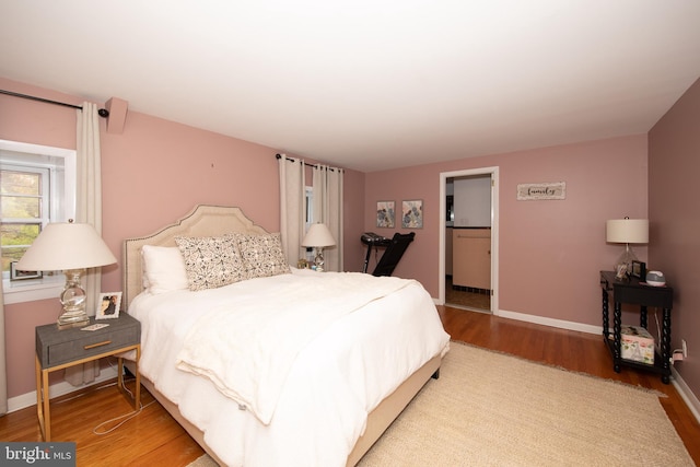 bedroom featuring light hardwood / wood-style flooring