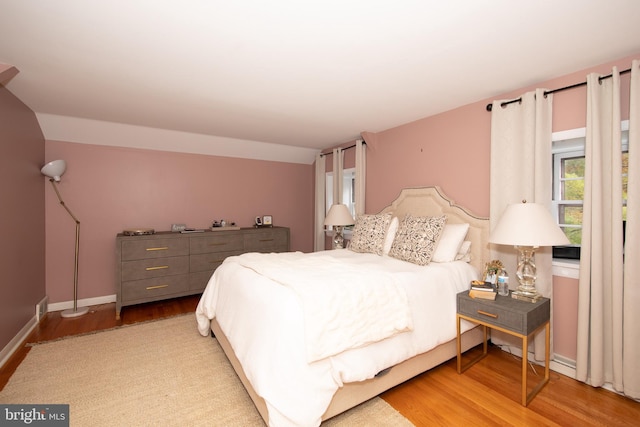 bedroom with light hardwood / wood-style flooring