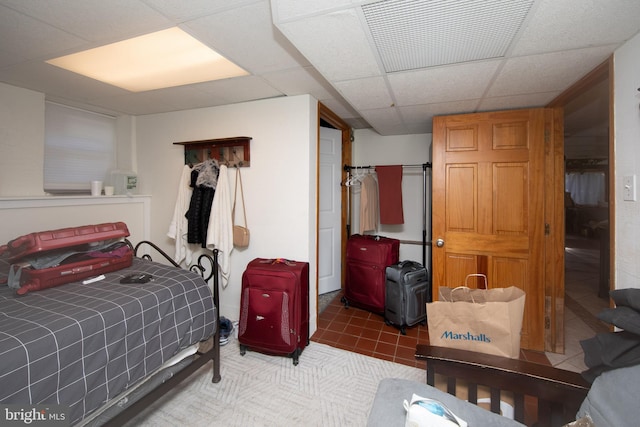 bedroom featuring a drop ceiling