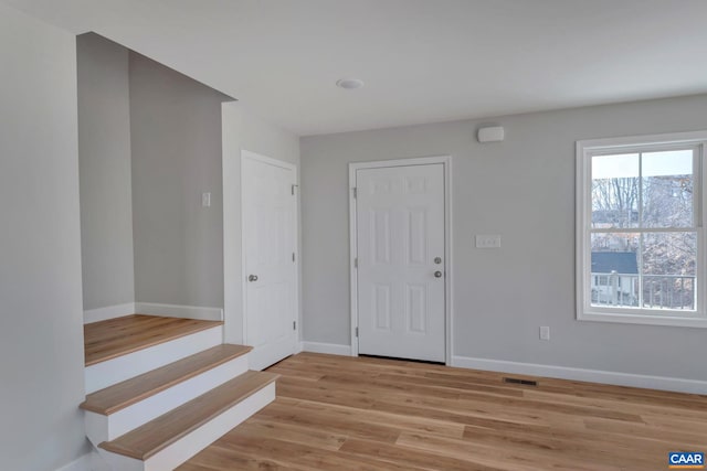 entrance foyer featuring light wood-type flooring