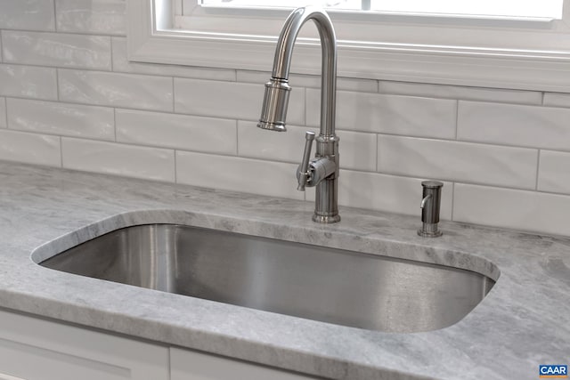 interior details with tasteful backsplash and sink