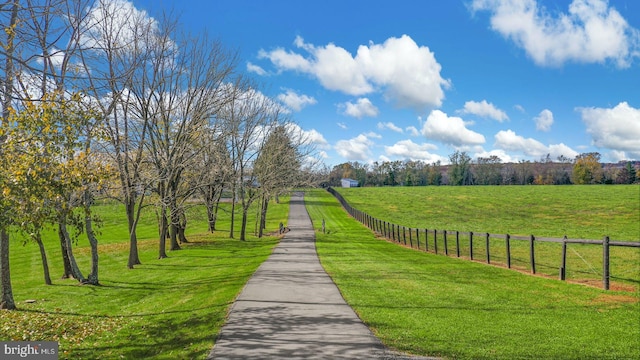 view of home's community featuring a yard