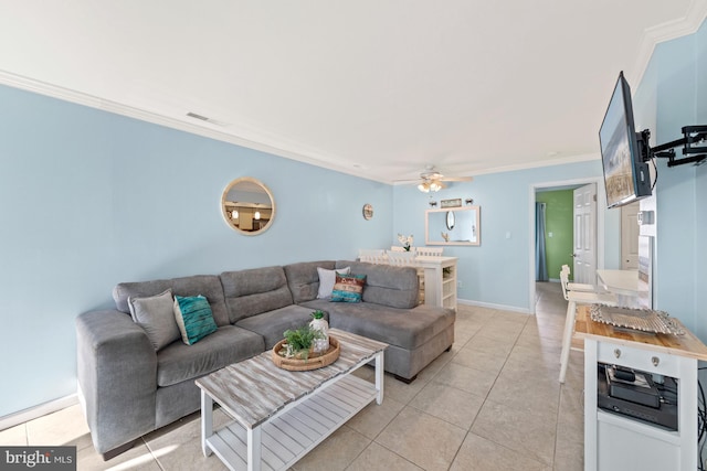 tiled living room with ceiling fan and ornamental molding