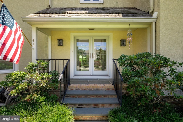 entrance to property featuring french doors