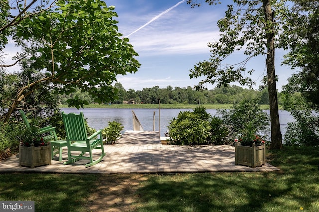 exterior space with a water view