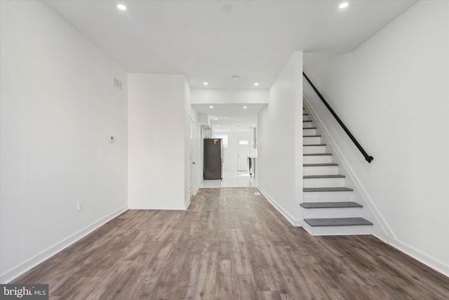 interior space with hardwood / wood-style floors