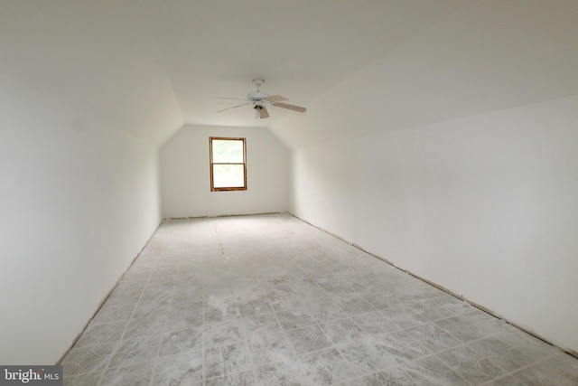 bonus room with ceiling fan and lofted ceiling