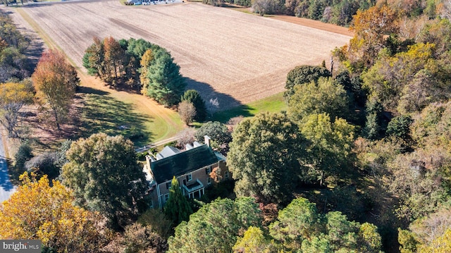 birds eye view of property featuring a rural view