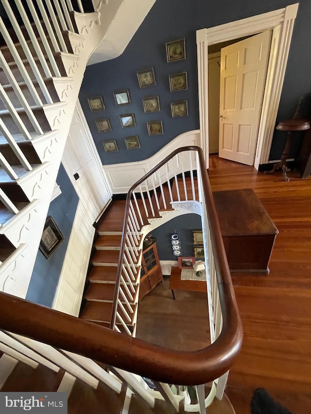 stairway with wood-type flooring