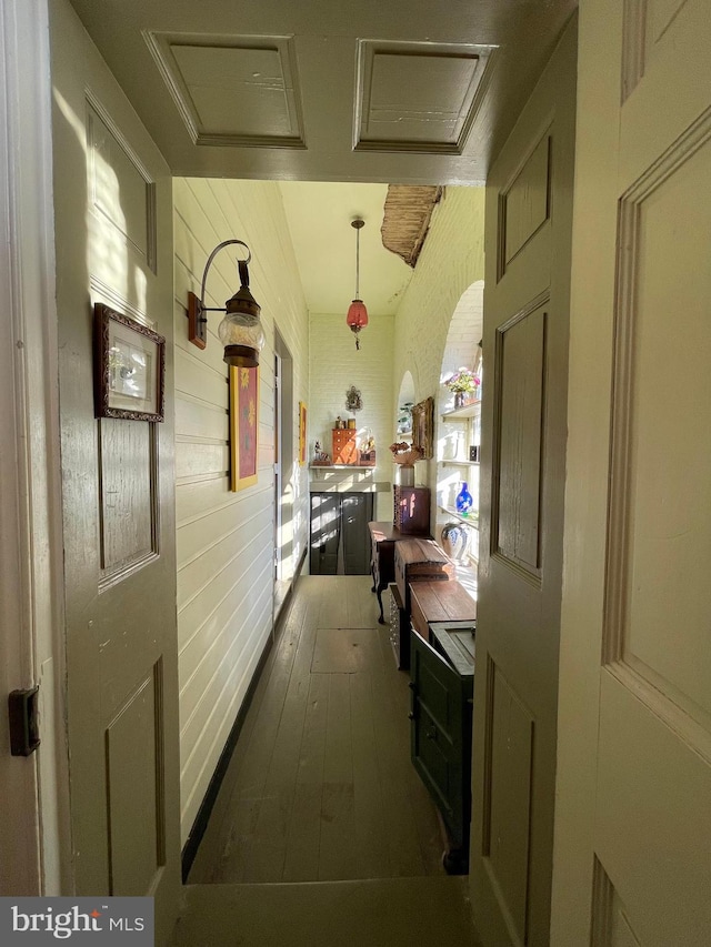 hall featuring dark wood-type flooring