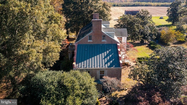 birds eye view of property featuring a rural view