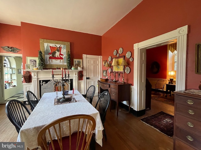 dining area with hardwood / wood-style flooring