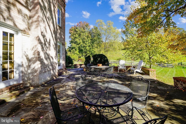 view of patio / terrace with an outdoor fire pit