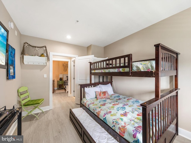 bedroom with light wood-type flooring