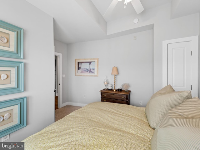 bedroom with ceiling fan and light colored carpet