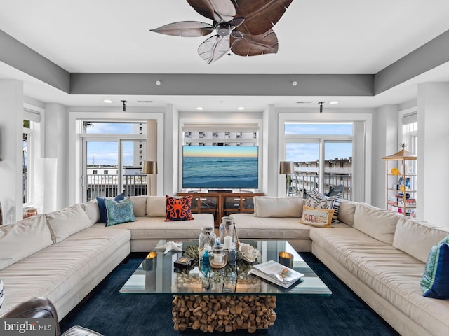 living room featuring ceiling fan