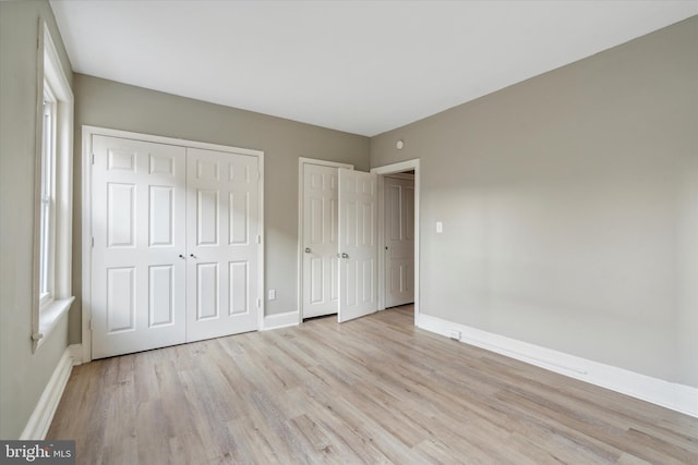 unfurnished bedroom with light hardwood / wood-style flooring