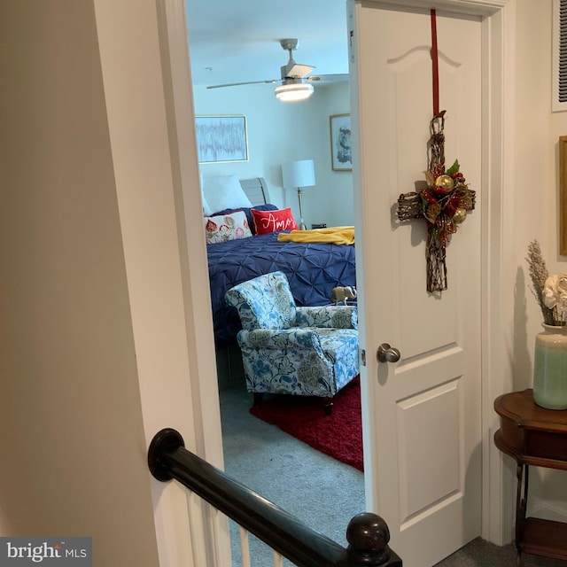 carpeted bedroom with ceiling fan