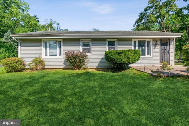 exterior space with a front yard