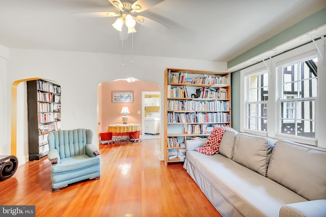 living area featuring ceiling fan and light wood-type flooring