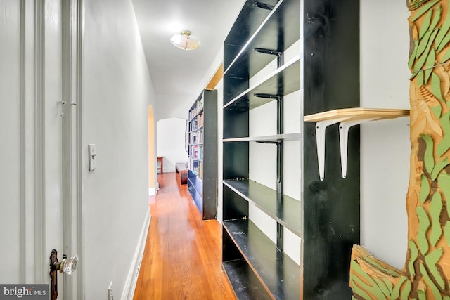 corridor featuring light hardwood / wood-style floors