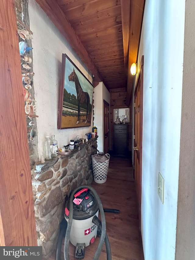 corridor with hardwood / wood-style flooring and wood ceiling