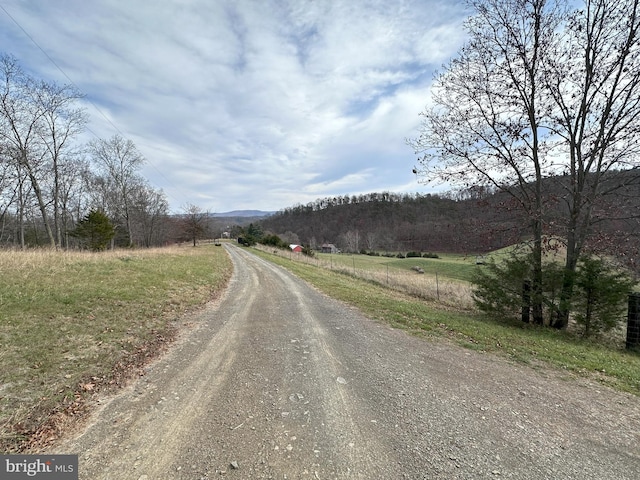 view of road featuring a rural view