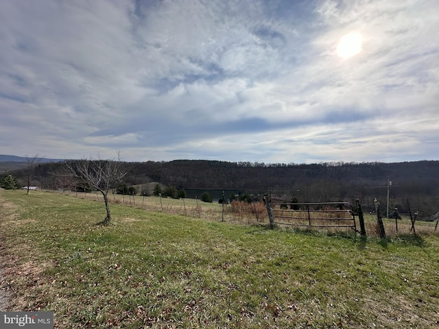 view of mountain feature with a rural view