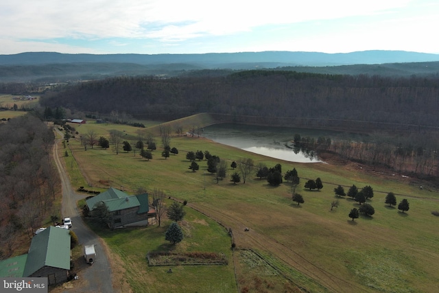 aerial view featuring a rural view and a water and mountain view