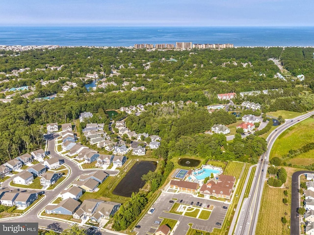 drone / aerial view with a water view