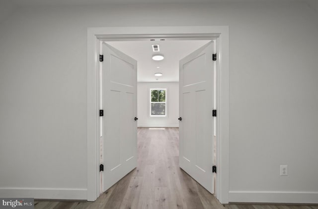 hall featuring light wood-type flooring