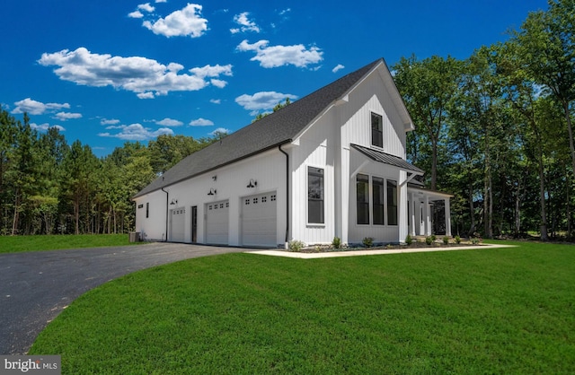 exterior space with a front lawn and a garage