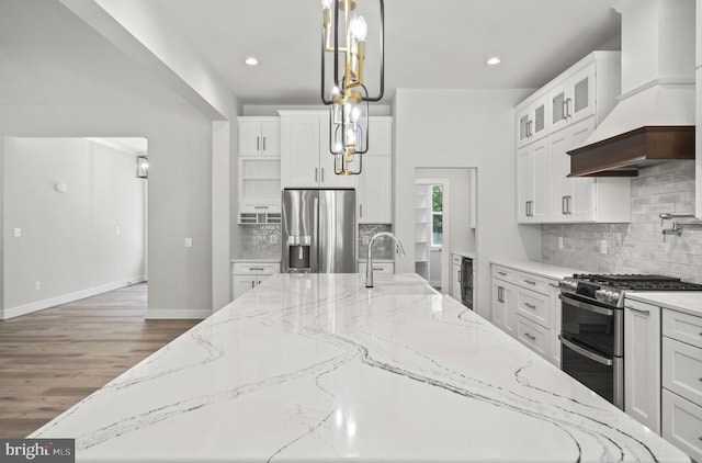 kitchen featuring white cabinets, stainless steel appliances, dark wood-type flooring, and custom exhaust hood