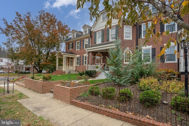 multi unit property featuring covered porch