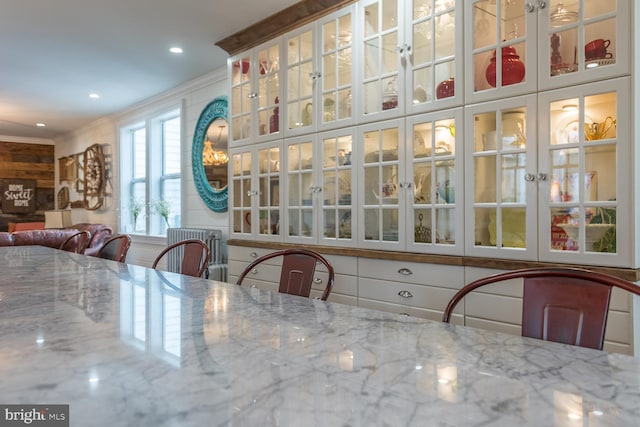 dining area with ornamental molding