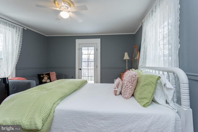 bedroom with access to exterior, ceiling fan, and ornamental molding