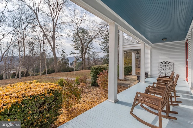 wooden deck with a porch