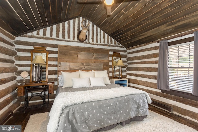 bedroom featuring hardwood / wood-style flooring, wood walls, lofted ceiling, and wooden ceiling