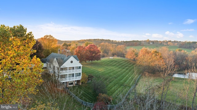 birds eye view of property featuring a rural view