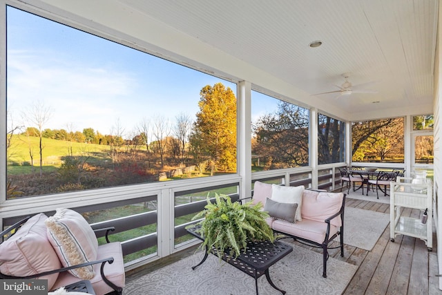 exterior space featuring ceiling fan